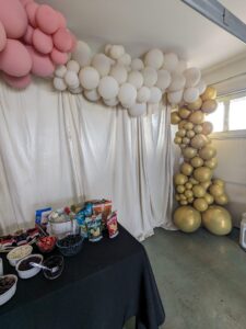 Food with balloons in the back